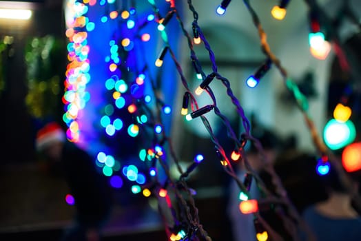Christmas garlands with colorful lights decorate the decor for new year