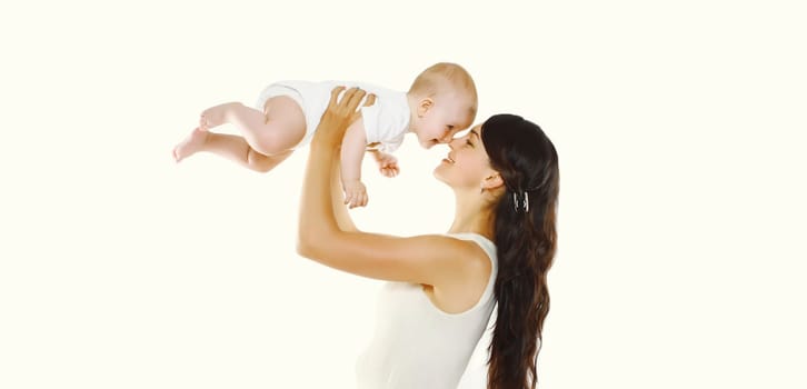 Happy cheerful smiling young mother holding baby on white studio background