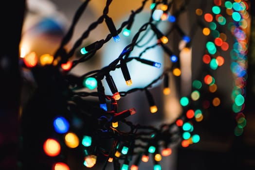 Christmas garlands with colorful lights decorate the decor for new year