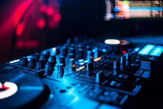 control buttons and mixing music on professional equipment for mixing and DJ