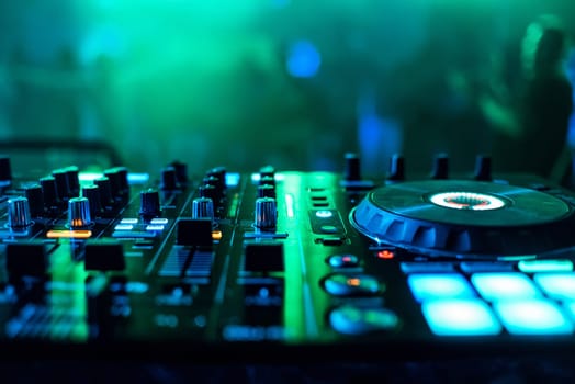 supervisors and regulators music mixer DJ to play music with blurred green background