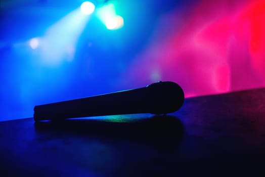 professional microphone in the booth at party in a nightclub