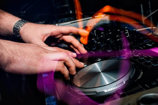 music console with controllers for DJ and hands, color