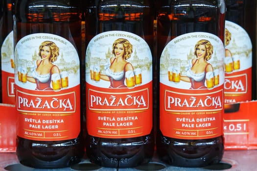 Tyumen, Russia-March 02, 2024: Prazacka Czech bottled light beer Prazacka made using the traditional technology in a superstore