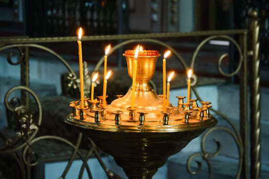burning candles at the altar in Christian Orthodox church