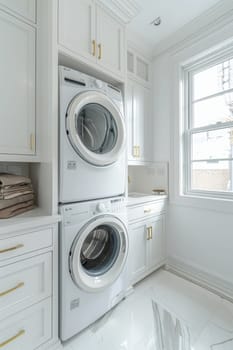 A white laundry room with a washer and dryer.