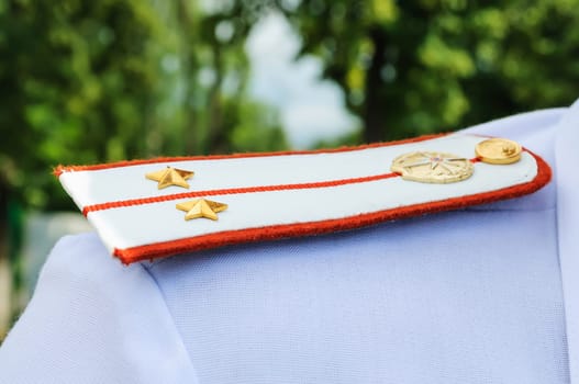 Shoulder straps of Russian military police officers on a form close-up