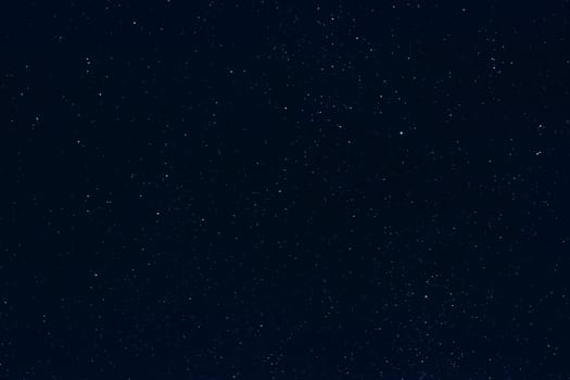 night dark blue sky with many colored shining stars