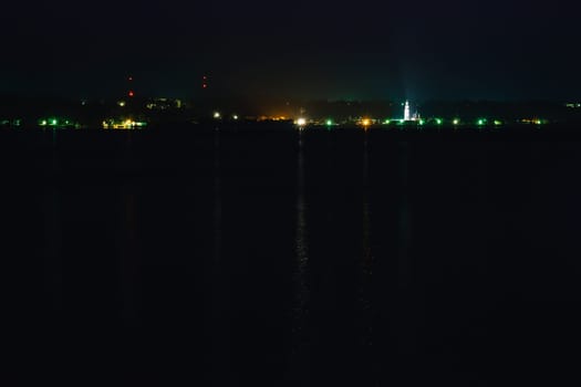 night city lights with the Church on the river with reflection in water