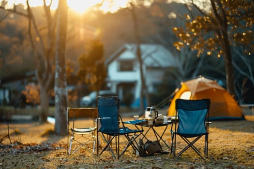 Camping outdoors with lots of sunlight. tent, chairs, a tent BBQ rack, and more.