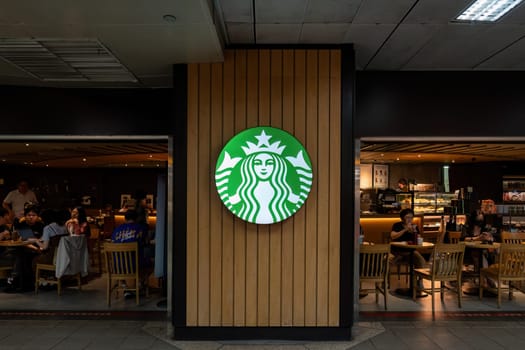 Taipei Taiwan - April 28, 2024 : Starbucks coffee logo in front of the shop.