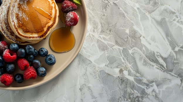 A plate of golden pancakes topped with syrup and surrounded by fresh berries, set against a marbled white background. Banner with copy space.