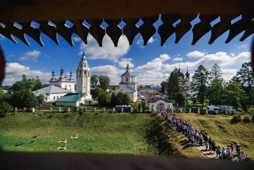 LUH, RUSSIA - AUGUST 27, 2016: Temple ensemble of the village of Luh with tourists on the holiday of Onion day, Russia