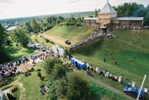 LUH, RUSSIA - AUGUST 27, 2016: crowd of people at a festive festival from above from a drone
