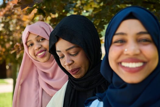 A symbolic portrayal of unity and sisterhood as a group of Middle Eastern Muslim women, wearing hijabs, come together for a collective photograph