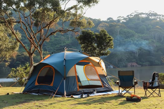 Camping outdoors with lots of sunlight. tent, chairs, a tent BBQ rack, and more.