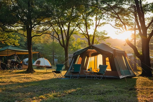 Camping outdoors with lots of sunlight. tent, chairs, a tent BBQ rack, and more.