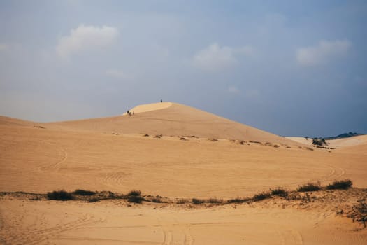 White Sand Dunes Muine in Vietnam with tourists in the summer