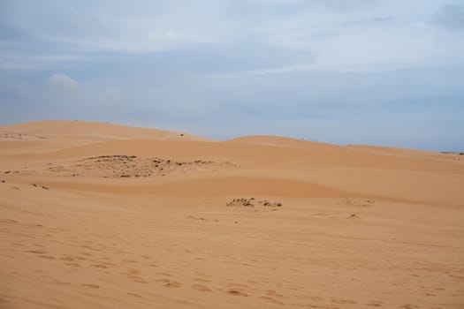 White Sand Dunes Muine in Vietnam with tourists in the summer