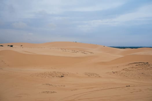 White Sand Dunes Muine in Vietnam with tourists in the summer