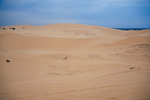 White Sand Dunes Muine in Vietnam with tourists in the summer