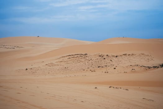 White Sand Dunes Muine in Vietnam with tourists in the summer