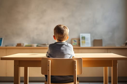 A young boy seen from behind, sitting attentively at a classroom desk, highlights the quiet focus and learning environment of a modern school setting. Copy space for text. Generative AI