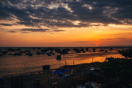 boats for fishing on the sea in Vietnam at sunset
