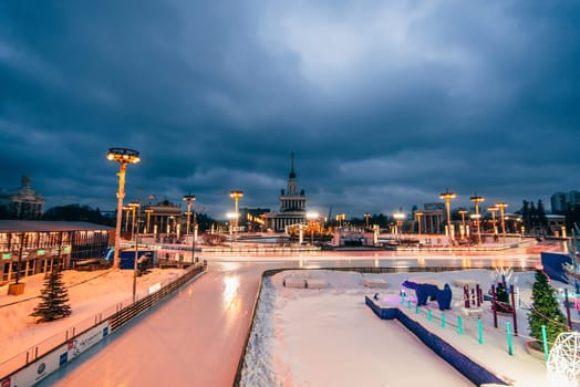 MOSCOW, RUSSIA - DECEMBER 25, 2016: The main pavilion VDNH and Fountain Friendship of the people in Moscow, Russia