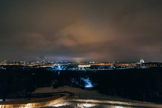 MOSCOW, RUSSIA - DECEMBER 25, 2016: A view of the Luzhniki stadium from Sparrow hills in Moscow at night