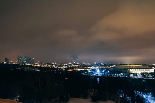MOSCOW, RUSSIA - DECEMBER 25, 2016: A view of the Luzhniki stadium from Sparrow hills in Moscow at night