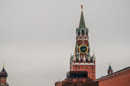 clock on the Spasskaya tower in red square in Moscow, Russia