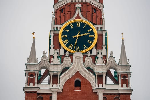clock on the Spasskaya tower in red square in Moscow, Russia