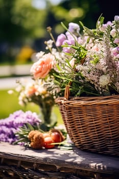 Summer garden harvest, farmers market and country buffet table, cakes and desserts in wicker basket in the garden, food catering for wedding and holiday celebration, floral decor idea