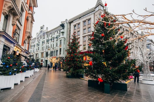 MOSCOW, RUSSIA - DECEMBER 23, 2016: New Year in Moscow, Arbat is decorated with Christmas trees and glowing lights