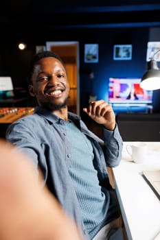 POV of analyst talks on videocall with accounting manager, trying to evaluate economic situation and help company CEO with new capital funds. Expert attends videoconference at desk, remote work.