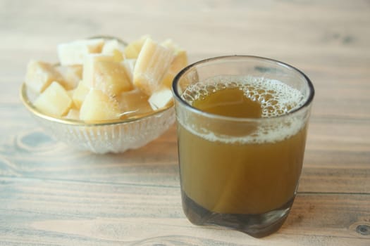 Sugarcane juice on a table .