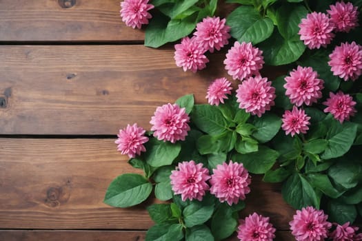 A fresh bouquet of pink flowers with lush greenery rests atop a textured wooden table, exuding rustic elegance.