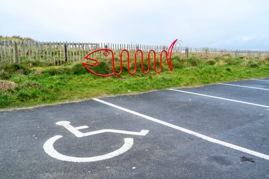 MURVAGH, COUNTY DONEGAL, IRELAND - JANUARY 21 2022 : Sign identifying the parking area for handicapped people.