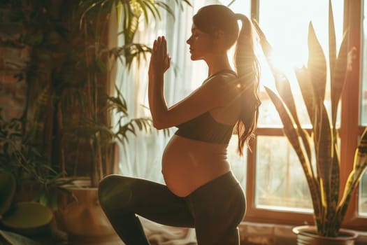 A radiant pregnant woman practices yoga poses in a sunlit studio