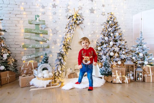 Child in his room decor christmas. Selective focus. Kid.