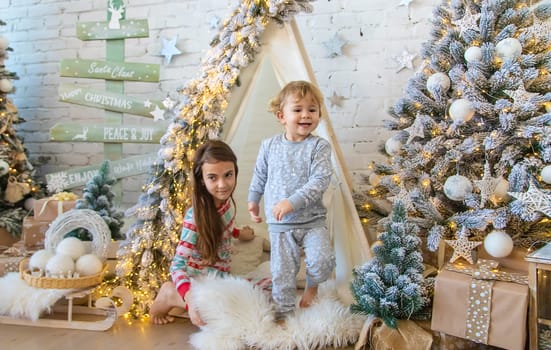 Child in his room decor christmas. Selective focus. Kid.