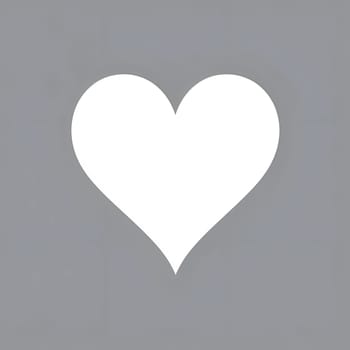 White heart on a gray background. Heart as a symbol of affection and love. The time of falling in love and love.