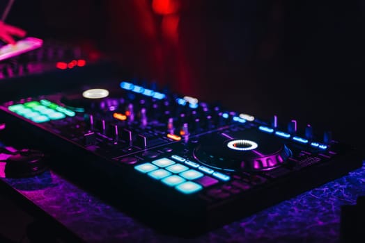 DJ mixer controller panel for electronic music in night club