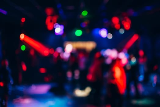 Colorful bokeh background with defocused blurred out lights at night
