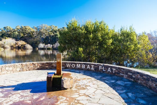 DAYLESFORD, AUSTRALIA - MAY 12 2024: Wombat Flat spring and landscape around Lake Daylesford in a cool late autumn afternoon in Daylesford, Victoria, Australia