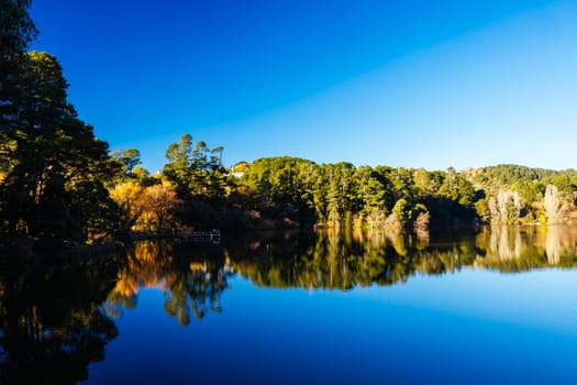 DAYLESFORD, AUSTRALIA - MAY 12 2024: Landscape around Lake Daylesford in a cool late autumn afternoon in Daylesford, Victoria, Australia