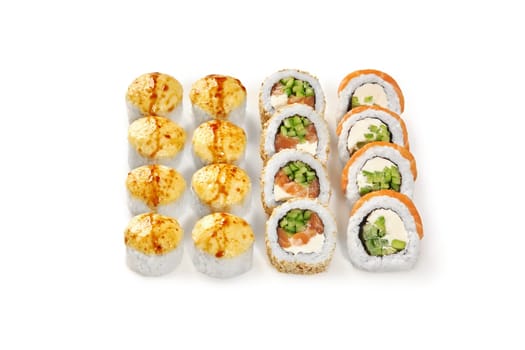 Appetizing array of sushi featuring rolls with baked cheese toppings, fresh salmon and sesame seeds, arranged on white background. Japanese sushi mastery