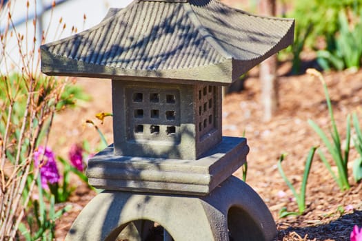 Traditional Japanese lantern in a serene garden, Fort Wayne, Indiana - perfect for themes of peace and tradition.