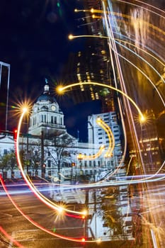 Abstract Art of Historic Fort Wayne courthouse shines amid modern city lights and dynamic nightlife.